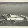 Construction - Men push float into lake