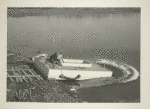 Construction - Men push float into lake