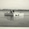 Construction - Men on float in lake