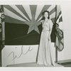 Contests - Woman posed in front of Arizona flag