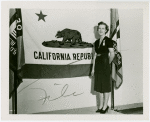 Contests - Woman posed in front of California flag