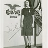 Contests - Woman posed in front of Iowa flag
