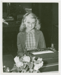 Contests - Woman at typewriter
