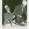 Contests - Evelyn Del Barrio and Tony Sarg at Ham and Turkey Carving contest