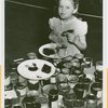 Contests - Girl sampling Jam and Jelly World's Series winners