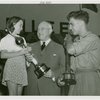 Contests - Super Girl and Super Man contest winners with Harvey Gibson