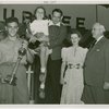 Contests - Super Man and Super Girl contest winners with Harvey Gibson and others