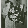Contests - America through the Needle's Eye - Woman with embroidered cloth