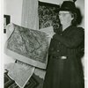 Contests - America through the Needle's Eye - Woman with embroidered tapestry