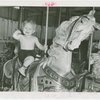 Contests - Baby Day - Baby Day contest winner on carousel