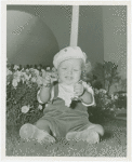 Contests - Baby Day - Baby in front of Trylon and Perisphere