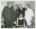 Contests - Barbershop Quartets - Members of the Society for the Preservation and Encouragement of Barber Shop Quartet Singing in America, Inc. with barber shop owner