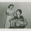 Contests - Beauty - Handsomest Iceman in All New York - Woman penciling in contestant's eyebrow