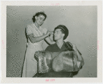 Contests - Beauty - Handsomest Iceman in All New York - Woman penciling in contestant's eyebrow