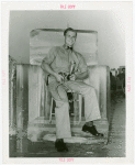 Contests - Beauty - Handsomest Iceman in All New York - Winner on ice block with trophy