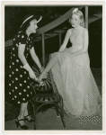 Contests - Cinderella - Gloria Swanson putting silver slipper on winner