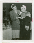 Contests - Coffee Making - Carmen Miranda drinking coffee with winner