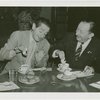 Contests - Doughnut - Two men dunking doughnuts