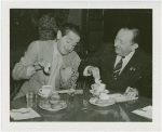 Contests - Doughnut - Two men dunking doughnuts