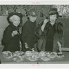 Contests - Doughnut - Three women tasting doughnuts