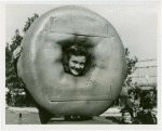 Contests - Doughnut - Girl with head in giant doughnut