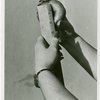 Contests - Doughnut - Person measuring doughnut size
