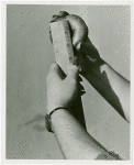Contests - Doughnut - Person measuring doughnut size