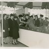 Contests - Golden Key - Women in line receiving keys from man in uniform