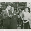 Contests - Hay Fever - Woman sneezing while man and woman judge