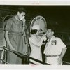 Contests - Hay Fever - Winner and runner-up on plane with American Air Lines stewardess