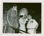 Contests - Hay Fever - Winner and runner-up on plane with American Air Lines stewardess