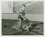 Contests - Turtle Derby - Boy on winning tortoise