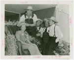 Continental Baking Co. - Harvest Queen receiving crown from James Montgomery Flagg while Grover Whalen and M. Lee Marshall (President, Continental Baking Co.) look on