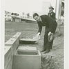 Cosmetics - Strong Box - Donald Deskey holding item