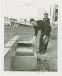 Cosmetics - Strong Box - Donald Deskey holding item
