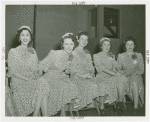 Coty - Female Guides - In identical dresses.