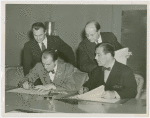 Czechoslovakia Participation - George Janacek (Commissioner General to World's Fair) signs contract, Grover Whalen and group look on