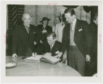 Czechoslovakia Participation - Benes, Edward (President) - Vladimir Hurban (Czechoslovakian Minister to the U.S.) signs book