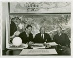 Davoe and Raynolds Co. signing contract