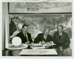 Davoe and Raynolds Co. signing contract
