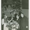Denmark Participation - George Bech (Danish Consul Genera) and Grover Whalen receive flower from woman in Danish costume
