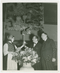 Denmark Participation - George Bech (Danish Consul Genera) and Grover Whalen receive flower from woman in Danish costume