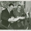 Dominican Republic Participation - Grover Whalen and Charles H. Wanzer (Dominican Chamber of Commerce) sign contract