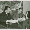 Dominican Republic Participation - Grover Whalen and Charles H. Wanzer (Dominican Chamber of Commerce) sign contract