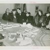 Dominican Republic Participation - Officials look at pavilion model