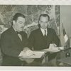 Estonian Consul General Charles Kuusik and Grover Whalen sign contract