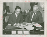 Ecuador Participation - Contract Signing - Officials sign contract