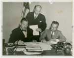 Ecuador Participation - Contract Signing - C.A. Arcentales (Commissioner General for Ecuador) and Grover Whalen sign contract