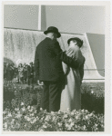 Electric Utilities - Couple in front of waterfall