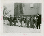 Electric Utilities - Electrified Farm - Cow and men outside barn